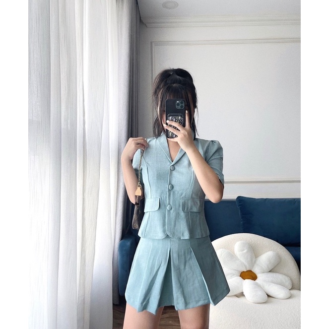 Áo vest cúc bọc + chân váy xoè