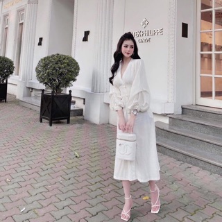 Đầm dáng dài cổ V nút bọc tay phồng màu trắng