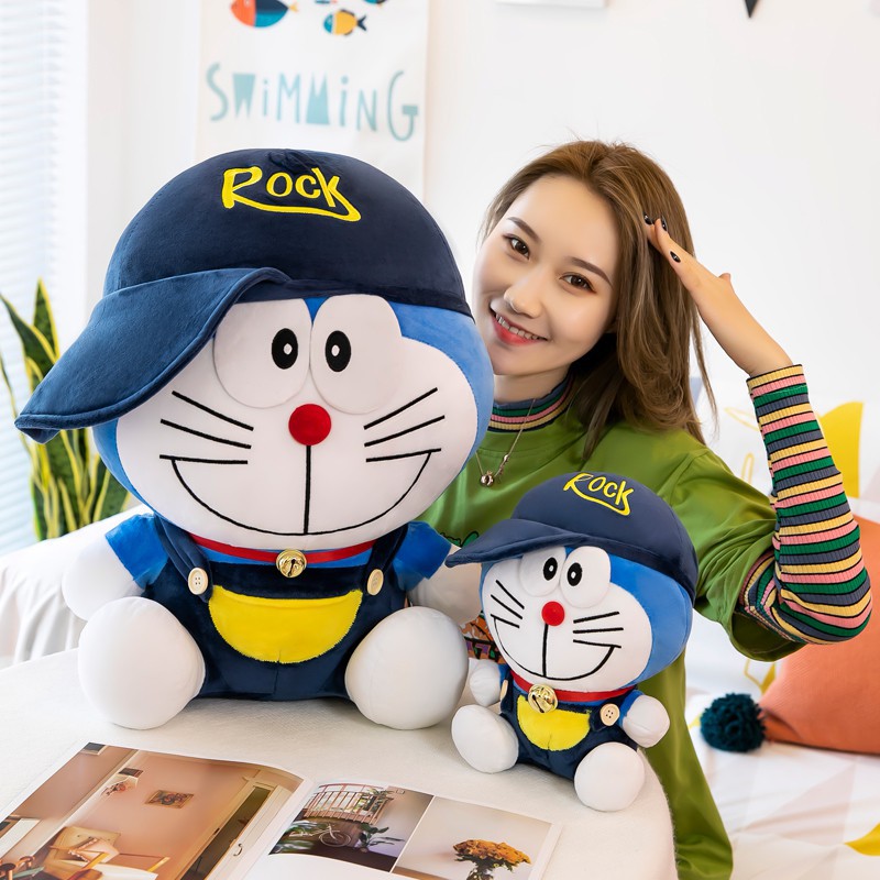 Gấu bông, gối ôm Doraemon đội mũ ngộ nghĩnh vải co dãn 4 chiều bông gòn 100%