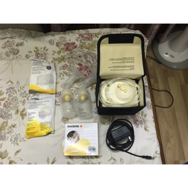 Máy hút sữa medela pump in style advance mới 90%