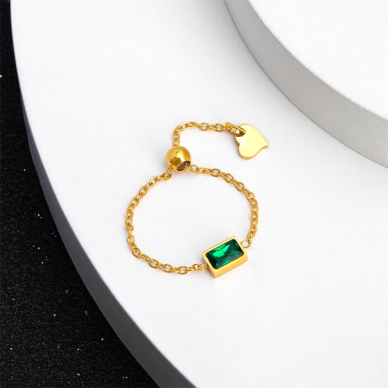 Nhẫn ThéP Titan Mạ VàNg 18k ĐíNh Đá NgọC LụC BảO