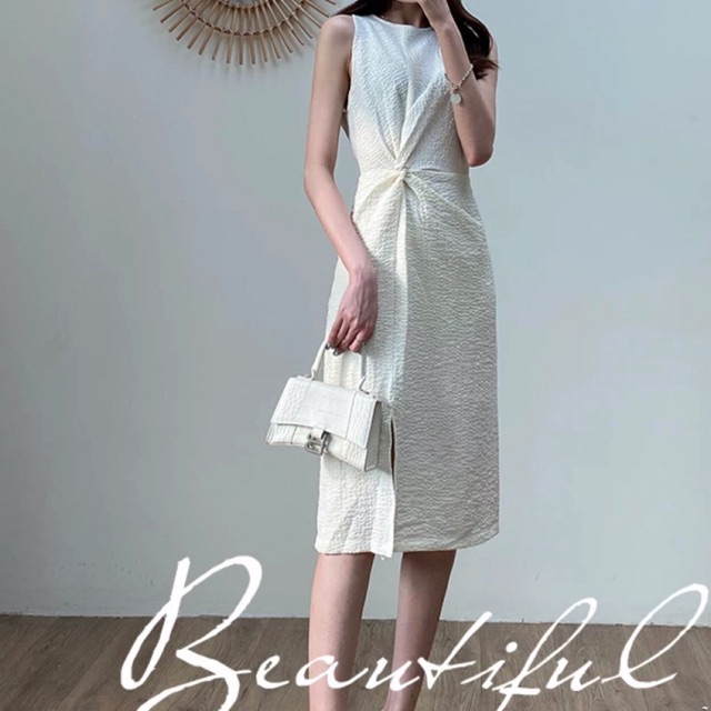 Đầm xoắn eo xẻ tà 2023