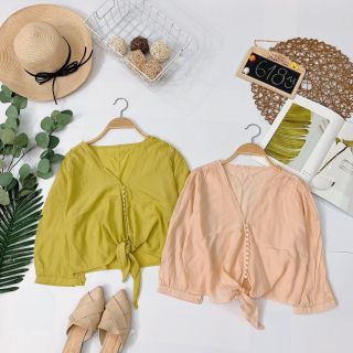 Áo nút bọc cột nơ eo