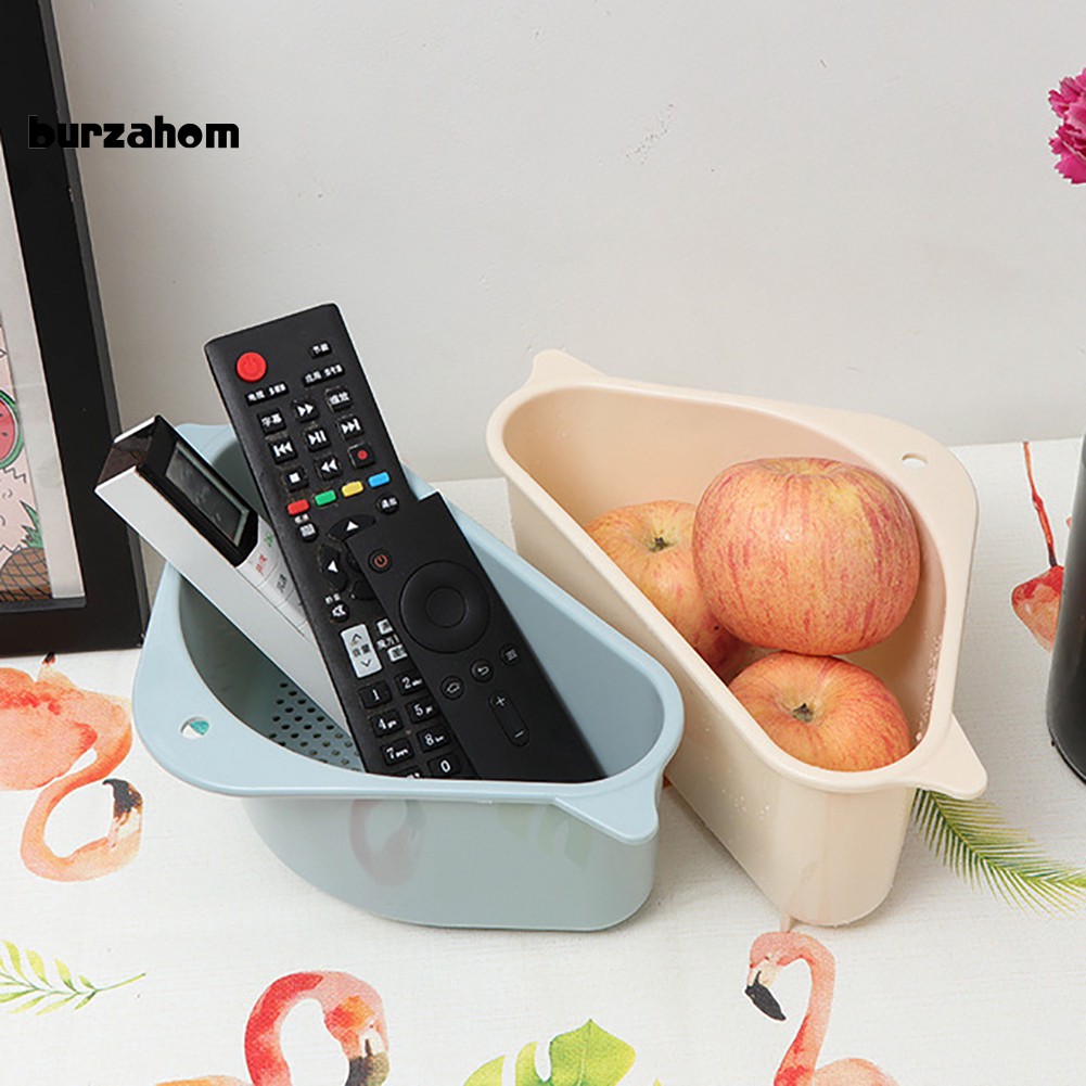 Kệ hình tam giác chất liệu bằng nhựa gắn ở bồn rửa chén đựng đồ