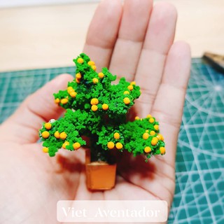 Mô hình cây mai, cây quất, cây đào