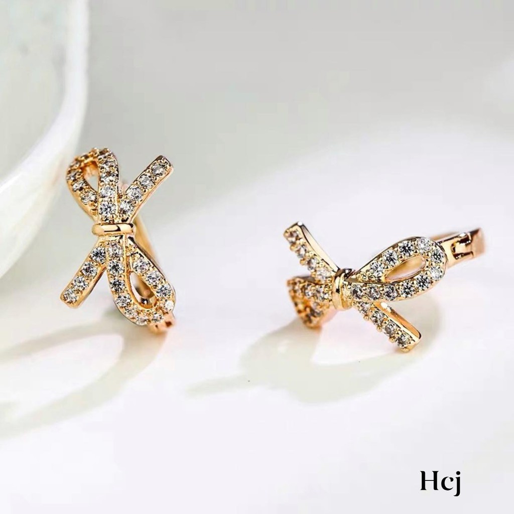 Bông tai xinh thắt nỡ bạc ta nguyên chất thêm xi vàng