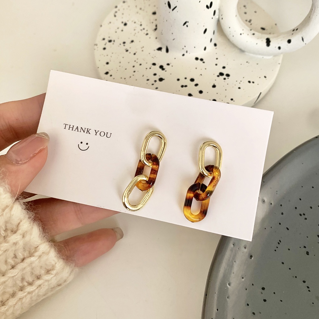 Khuyên Tai Kẹp Không Đối Xứng Màu Hổ Phách Phong Cách Âu Mỹ Mới