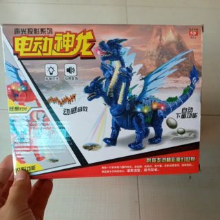 Đồ chơi khủng long 4 đầu đẻ trứng chiếu đèn 3D