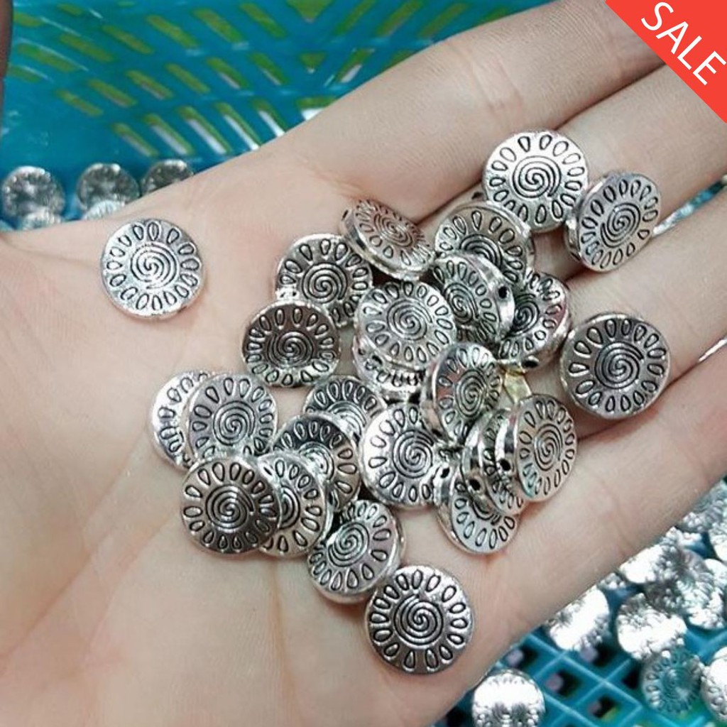 Charm xỏ vòng tròn hoa văn : 50g = 23k / 1 gói [ Charm giá sỉ 50g ]