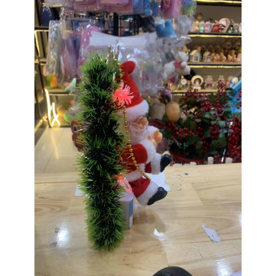 Đồ chơi ông già noel ngồi vòng nguyệt quế- Quà tặng giáng sinh cho bé yêu