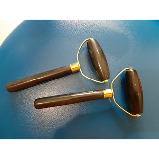 Cây lăn đá massage mặt