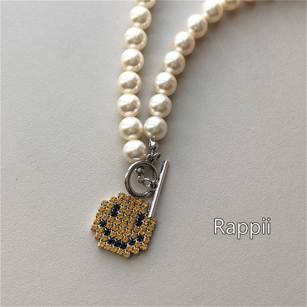 Vòng cổ hình mặt cười đính ngọc trai nhân tạo phong cách cổ điển