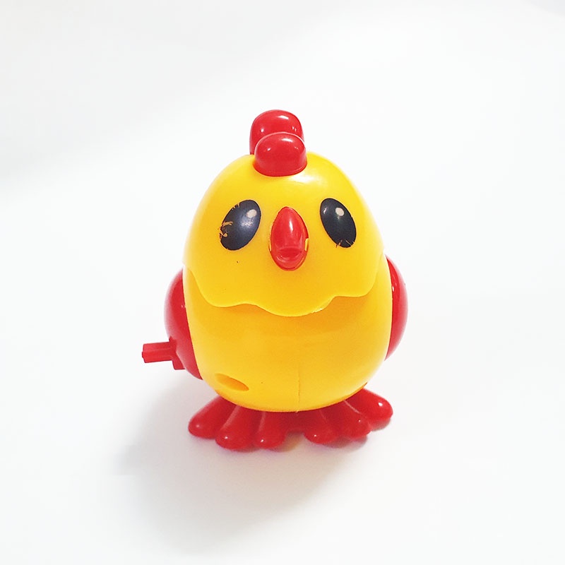 Gà nhảy dây cót vui nhộn không cần pin màu vàng đỏ bằng nhựa đồ chơi cho bé trai hay bé gái đều thích