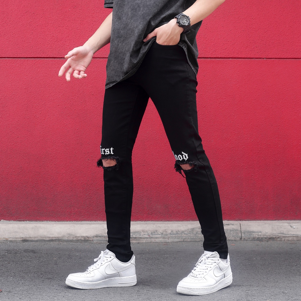 Quần Jean Nam Màu Đen Rách Gối Thêu Chữ First Blood Màu Trắng Chất Liệu Cotton Co Giãn Ống Ôm Form Skinny