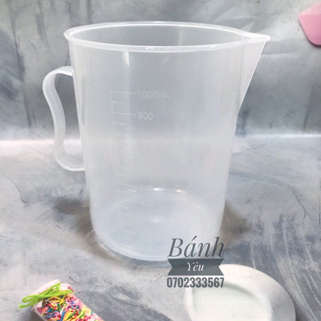 Ca nhựa đong lường nước