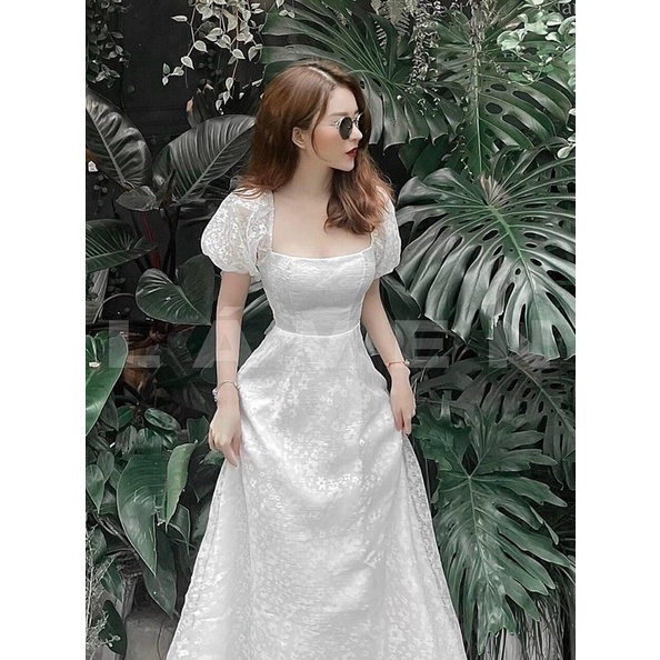 Váy trắng tiểu thư tay phồng cổ vuông hở lưng Naza