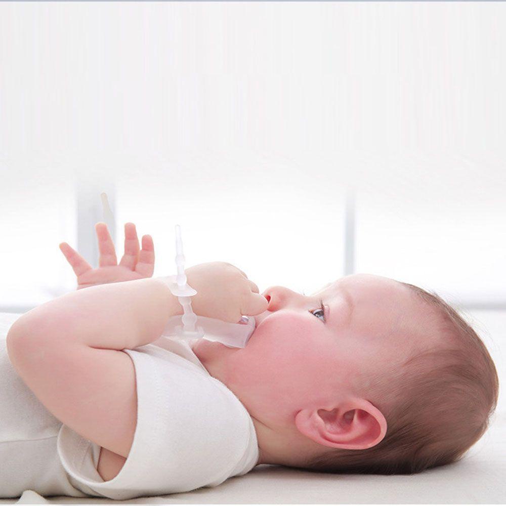 Đồ Chơi Ngậm Mọc Răng Bằng Silicone Đeo Ngón Tay Cho Em Bé