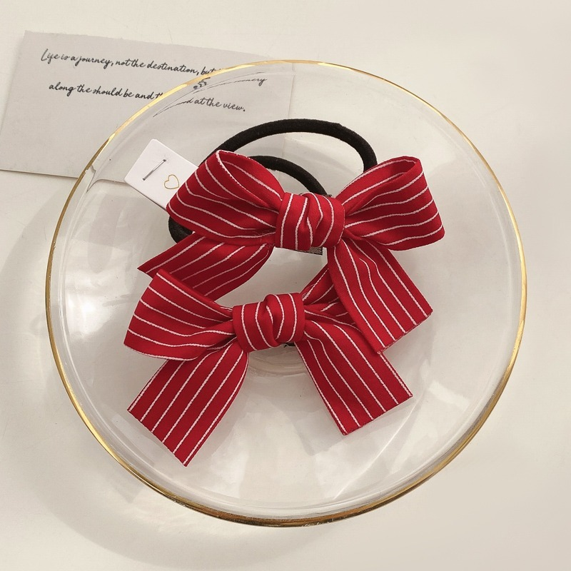 Thun cột tóc gắn nơ dễ thương phong cách Hàn Quốc