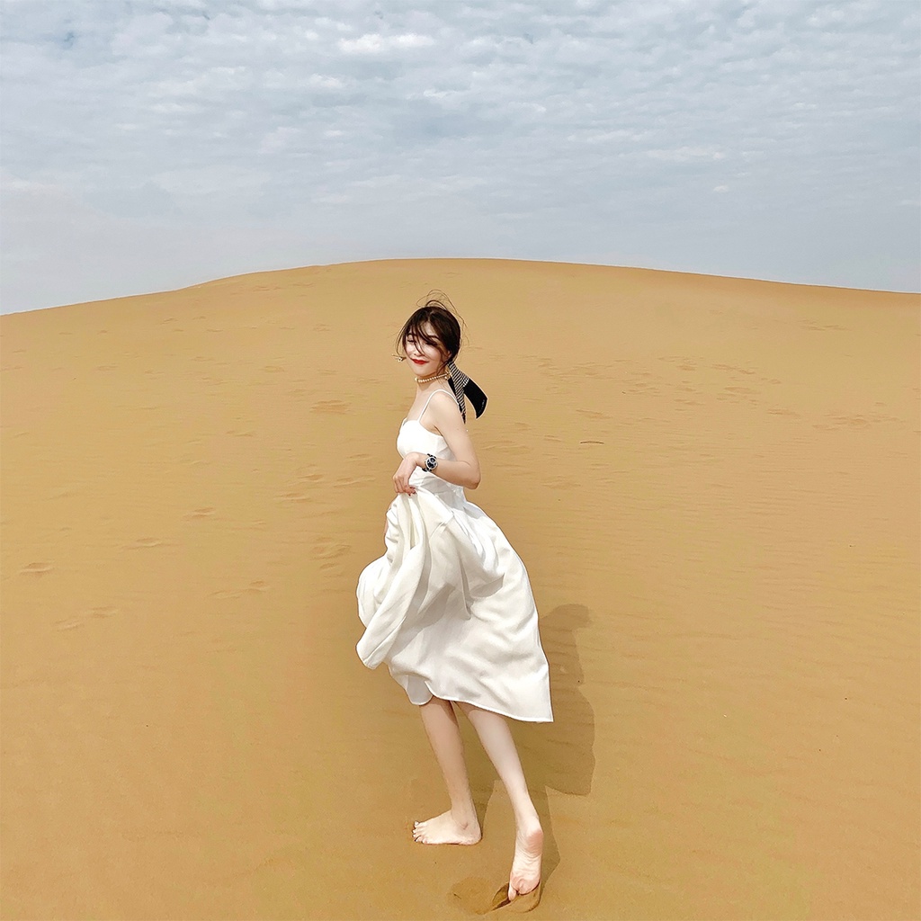 Váy cổ tích hai dây tiểu thư màu trắng tinh khiết tôn dáng eo Tulip flower