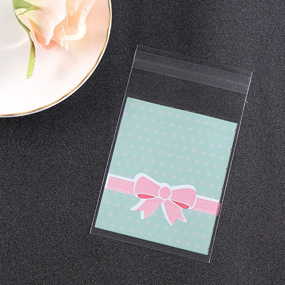 Set 100 túi nhựa đựng quà tặng màu hồng và xanh lá tùy chọn