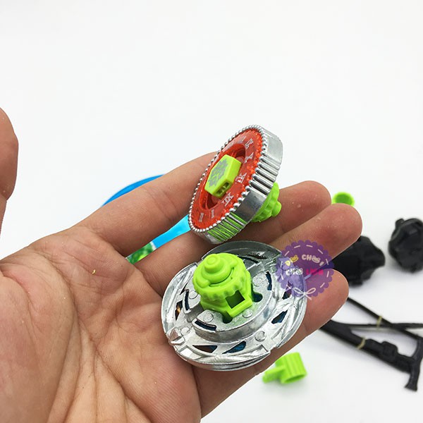 Vỉ đồ chơi sàn đấu 4 con quay 2 tay cầm