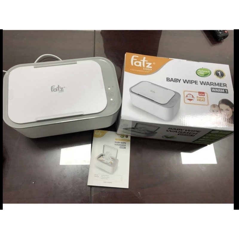 Thanh lý xe đẩy Combi tặng kèm combo máy hâm sữa và máy làm ấm khăn ướt fatz nguyên box