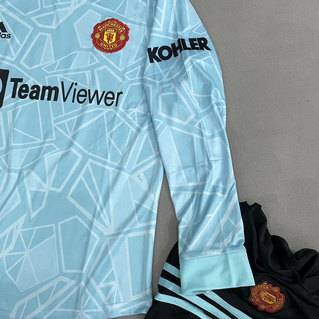 Bộ quần áo đá banh MU Xanh ngọc TM thiết kế Zuka tay dài FLG