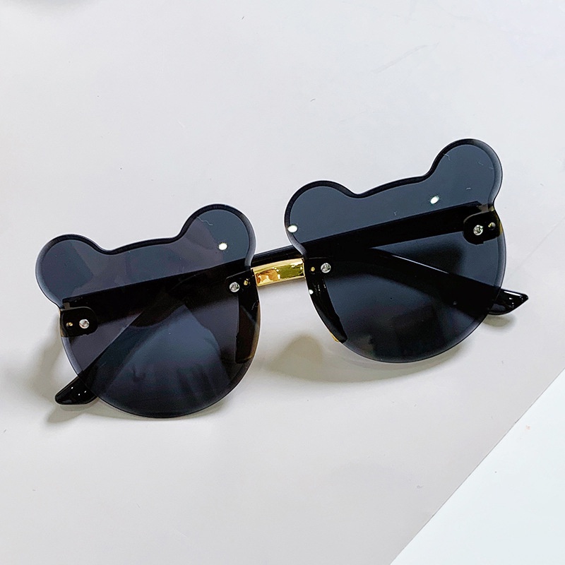 Kính mát gọng tròn màu trơn chống tia UV400 thời trang cho bé