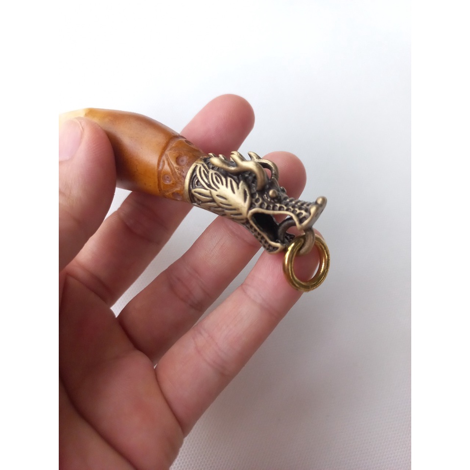 Mặt dây nanh báo nhân tạo đầu rồng