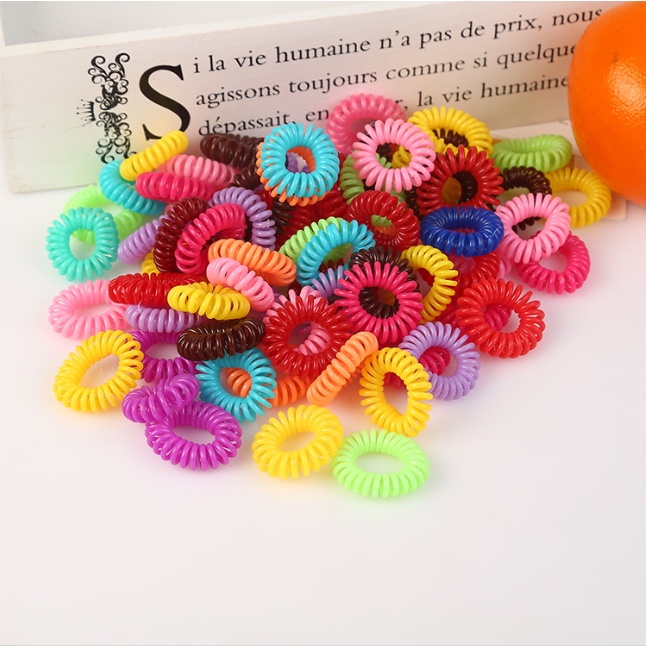 Dây buộc tóc lò xo, cột tóc xoắn nhiều màu, bằng nhựa dẻo - tránh gây rụng tóc