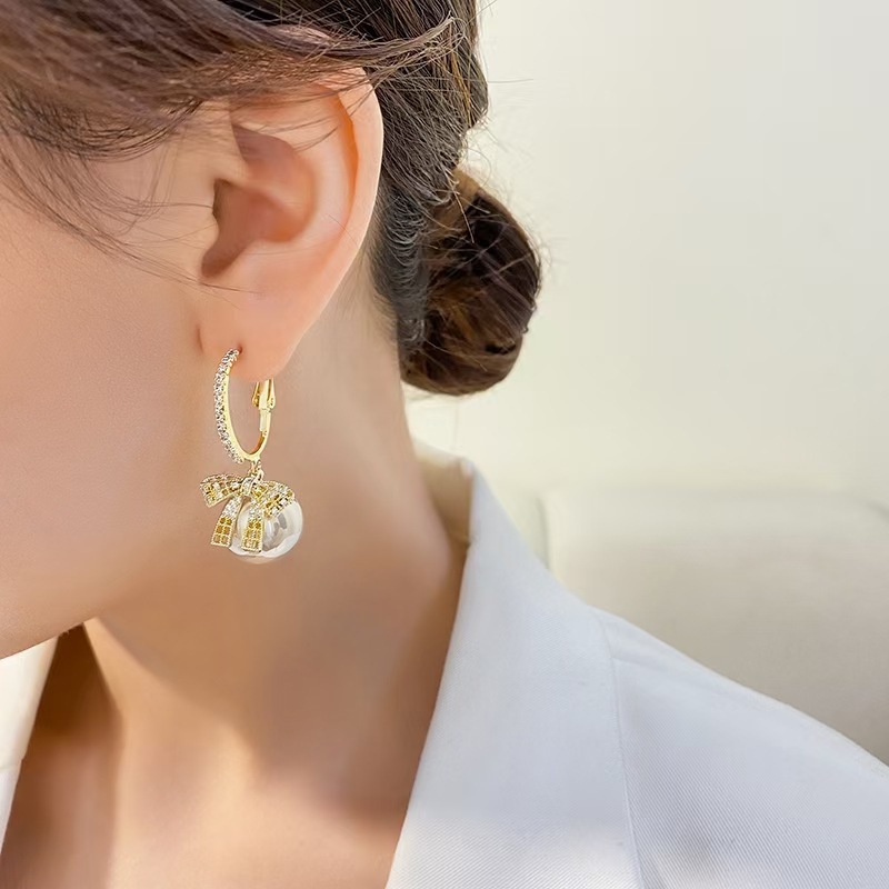 Khuyên tai nơ đính ngọc trai thiết kế mới 2021