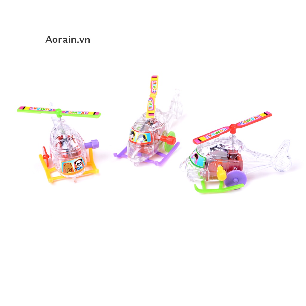 + 2Pcs Mini Clockwork Transparent Aircraft Somersault Running Wind Up Toy .