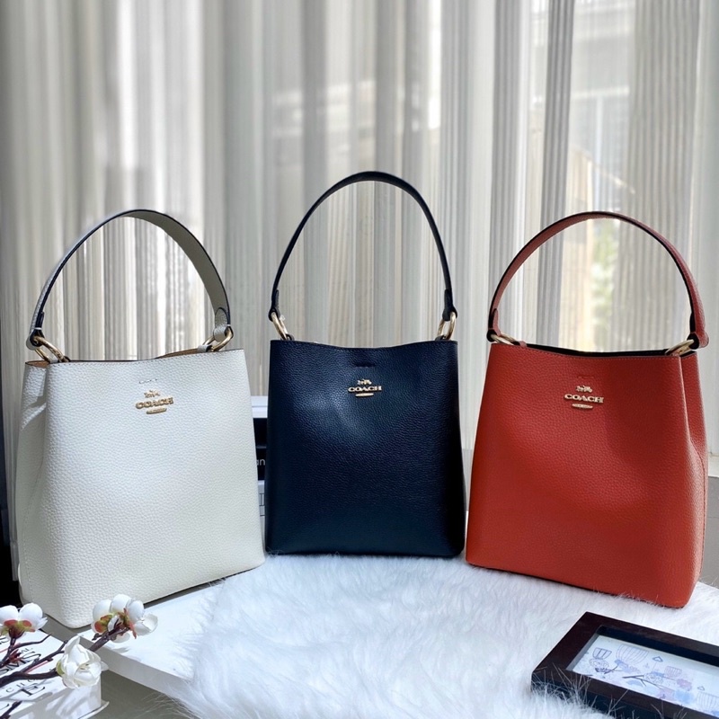 Túi đeo vai kèm dây đeo chéo Co@ch bucket