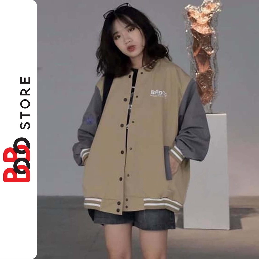 Áo khoác dù bomber in hình ở cánh tay và ngực áo form rông dành cho nam nữ - BoBo Store