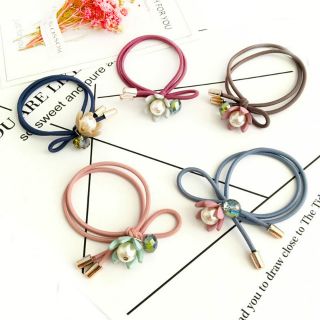 Cột tóc hoa rơi đính châu cute