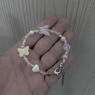 Vòng tay charm trắng