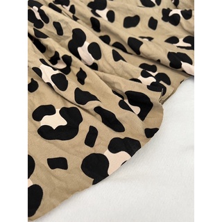 Vải thun cotton 2c hoạ tiết beo nền be