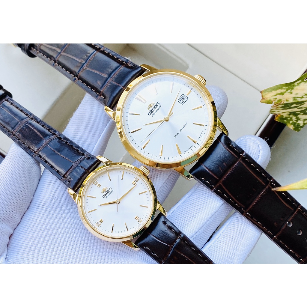 Đồng hồ đôi nam nữ Orient RA-AC0F04S10B RA-NB0104S10B