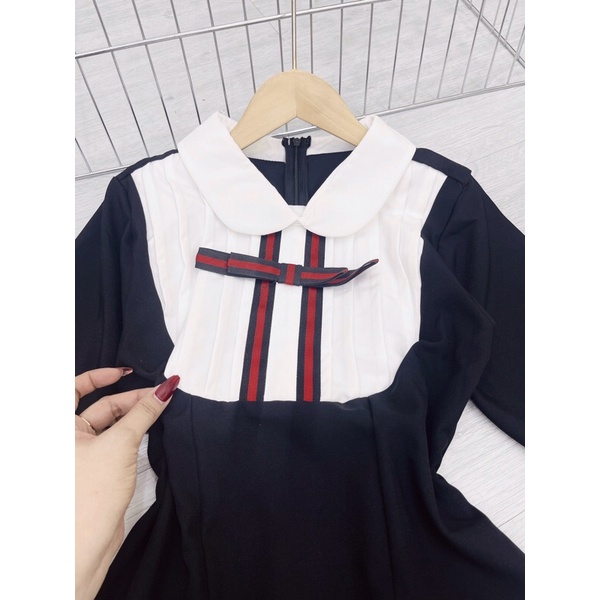 Đầm đen viền gucci