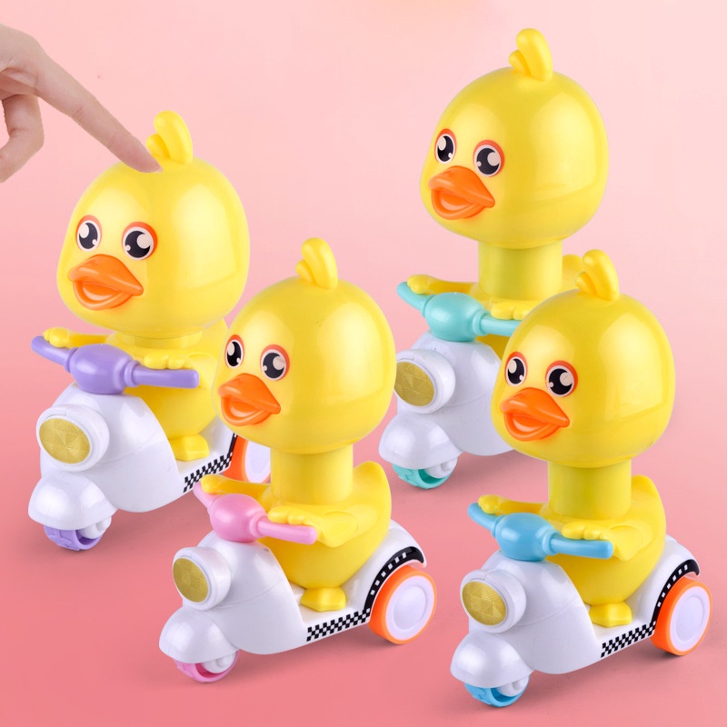 Đồ chơi vịt chạy xe Vespa