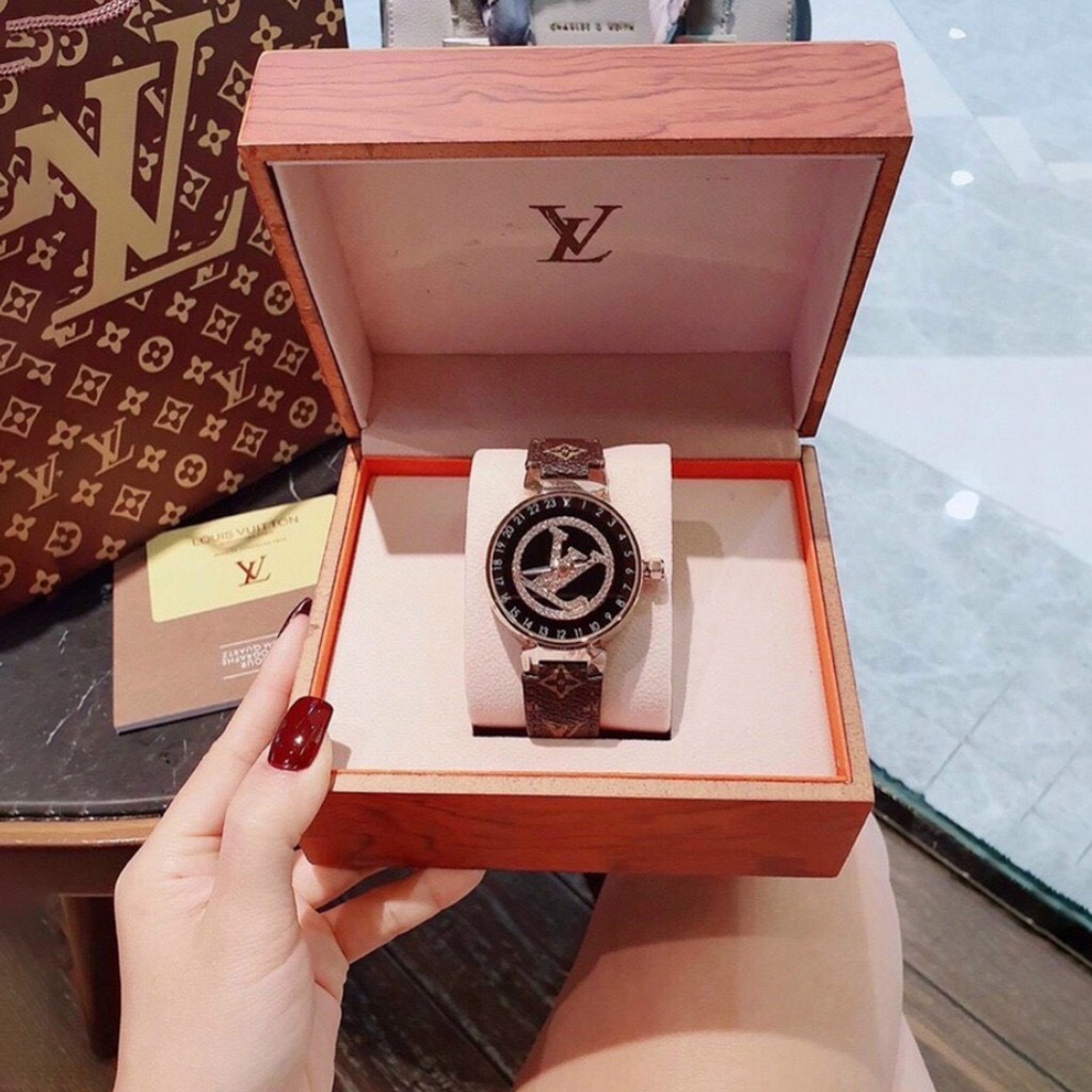 Đồng hồ nữ LV mặt xoay, đính đá, dây da có hoa văn, bảo hành 12 tháng