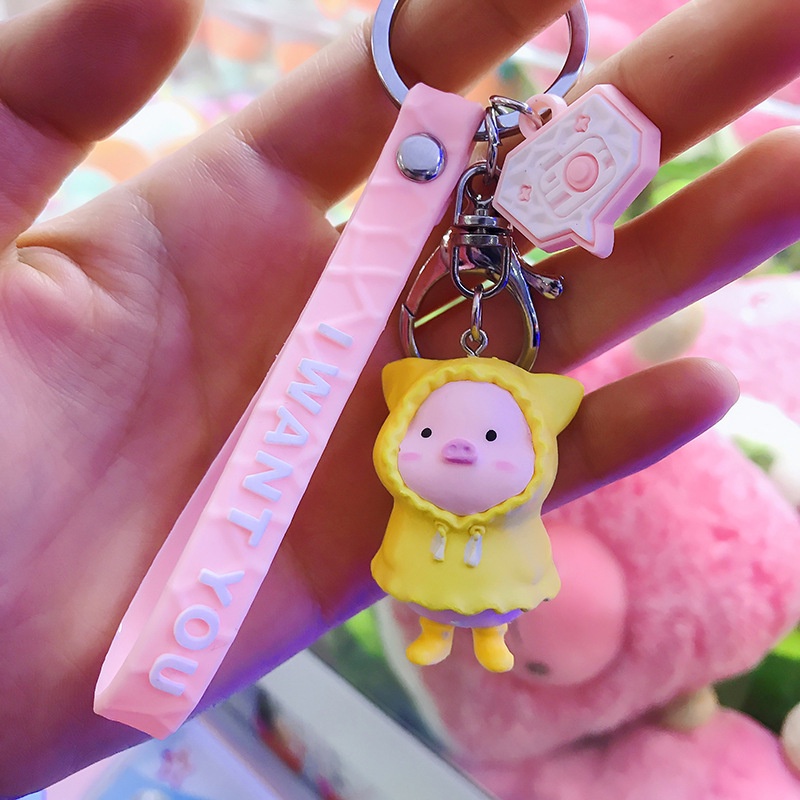 Hoạt Hình Móc Khóa Nhựa Hình Chú Heo Mặc Áo Mưa Dễ Thương