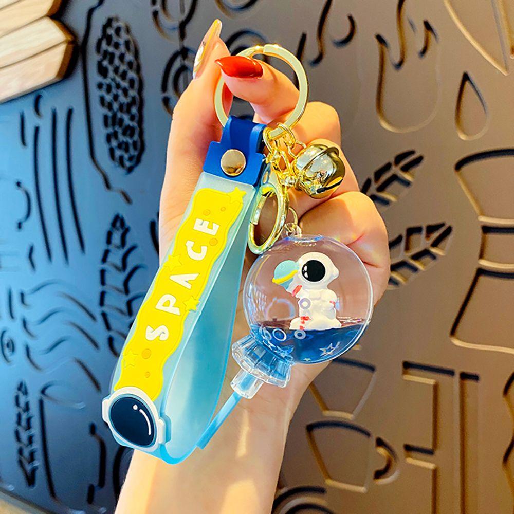 Móc Khóa Hình Phi Hành Gia Nổi Trên Mặt Nước Kim Tuyến Lấp Lánh Dễ Thương