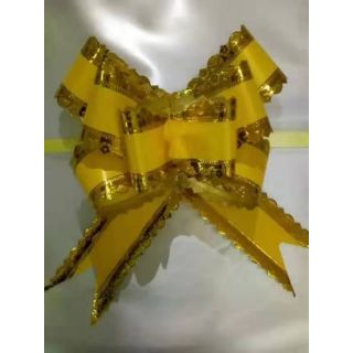 Nơ rút viền vàng 5cm. 1 túi 10 cái.