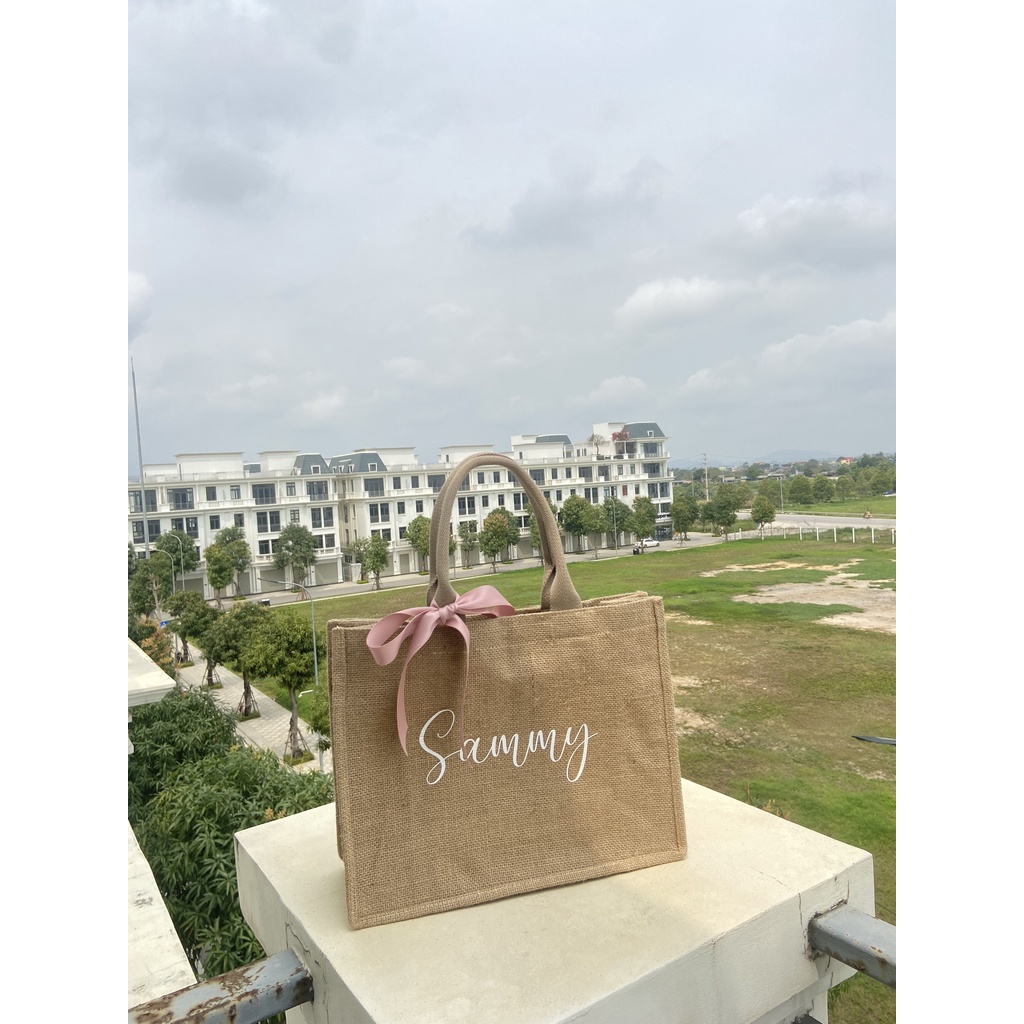Túi Cói In Tên Riêng Kèm Nơ Thời Trang Theo Yêu Cầu Đeo Vai Đi Biển, Đi Du Lịch Mang phong cách cá nhân
