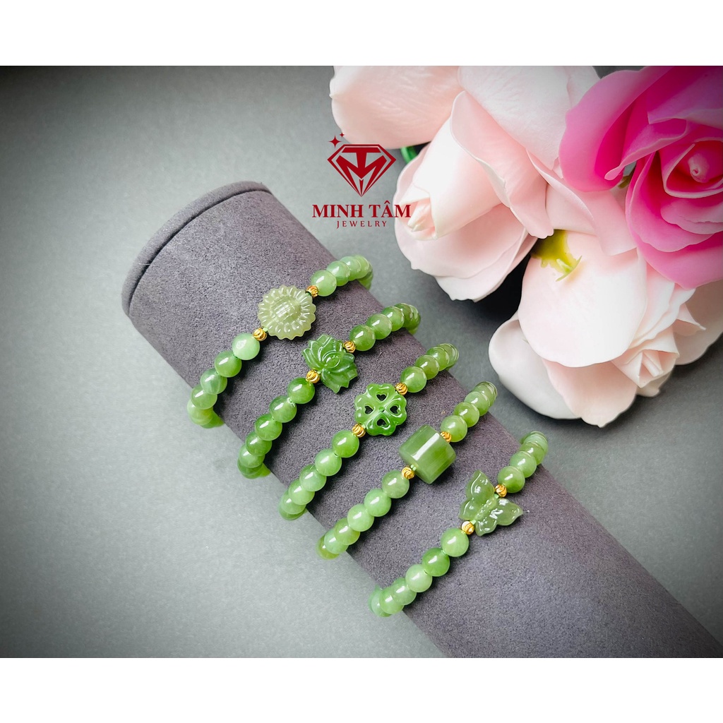 Vòng tay Ngọc Hòa Điền 6 ly mix charm sen, cỏ bốn lá, lu thống ngọc xanh lá bi Au 10k-Minh Tâm Jewelry