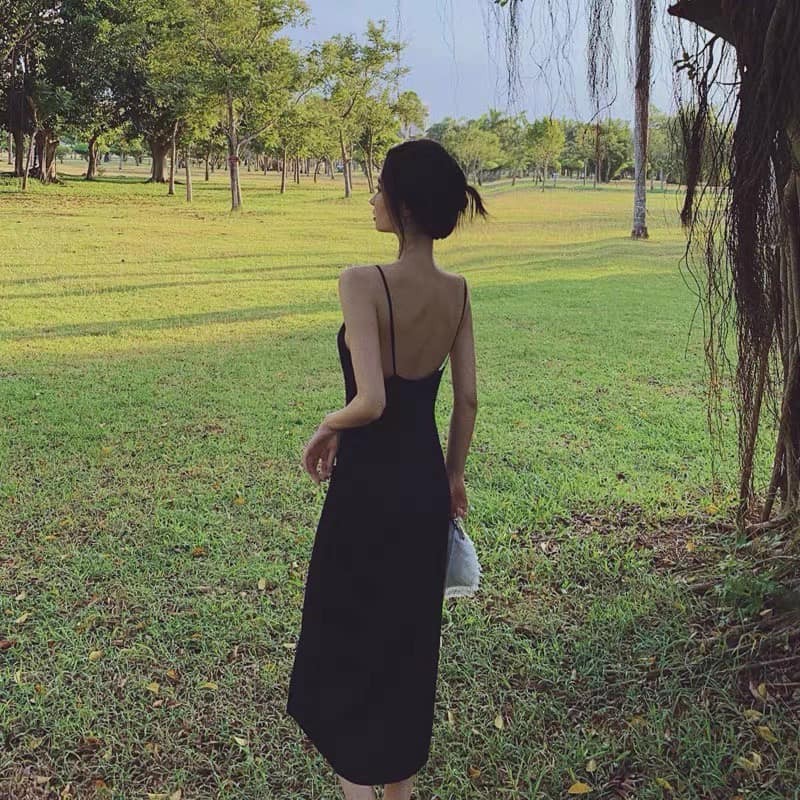 Đầm yếm nữ hở lưng dáng suông dài vải thun co dãn màu đen
