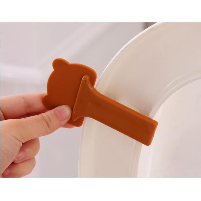 Miếng nhấc nắp bàn ngồi toilet