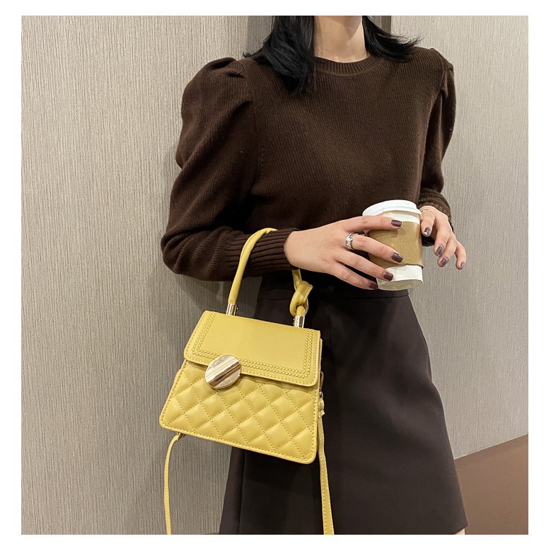 Túi nữ khoá chéo tròn