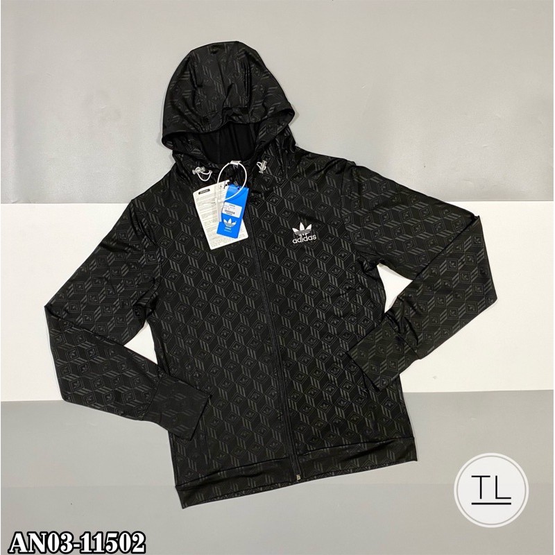 Áo Chống Nắng Das Vân Khối Logo 3D Thêu Cỏ Ba Lá